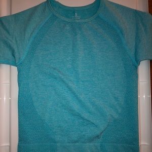 NVGTN blue crop top.